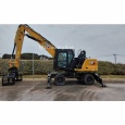 Колесный экскаватор Caterpillar MH3024