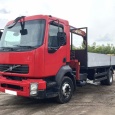 Бортовой грузовик VOLVO FLL 4x2