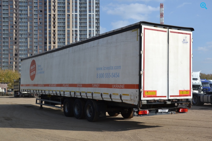 Шторно-бортовой полуприцеп Тонар