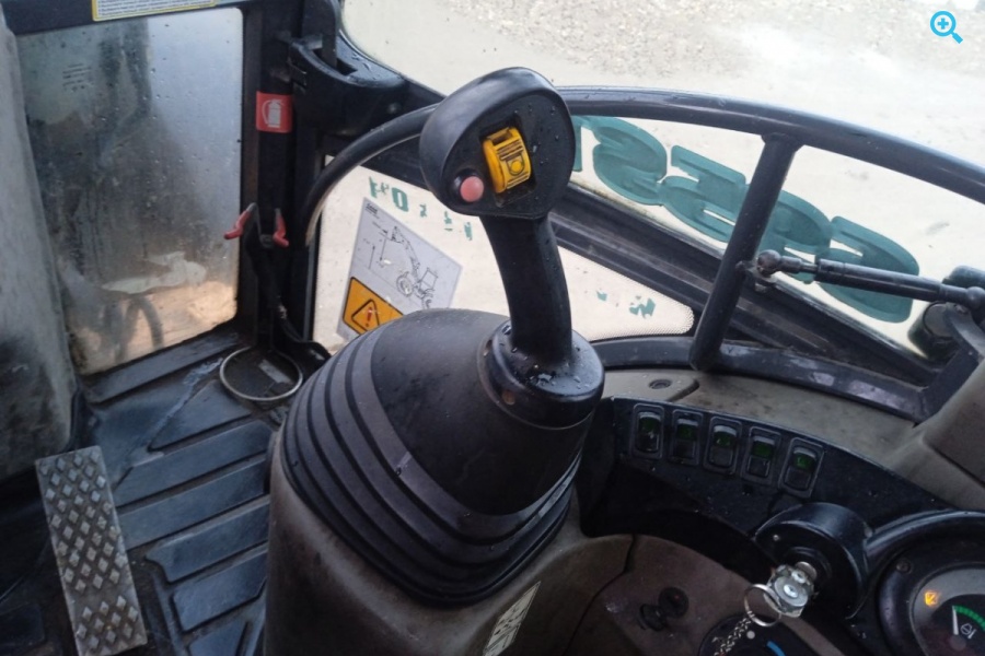 Экскаватор-погрузчик Case 695ST